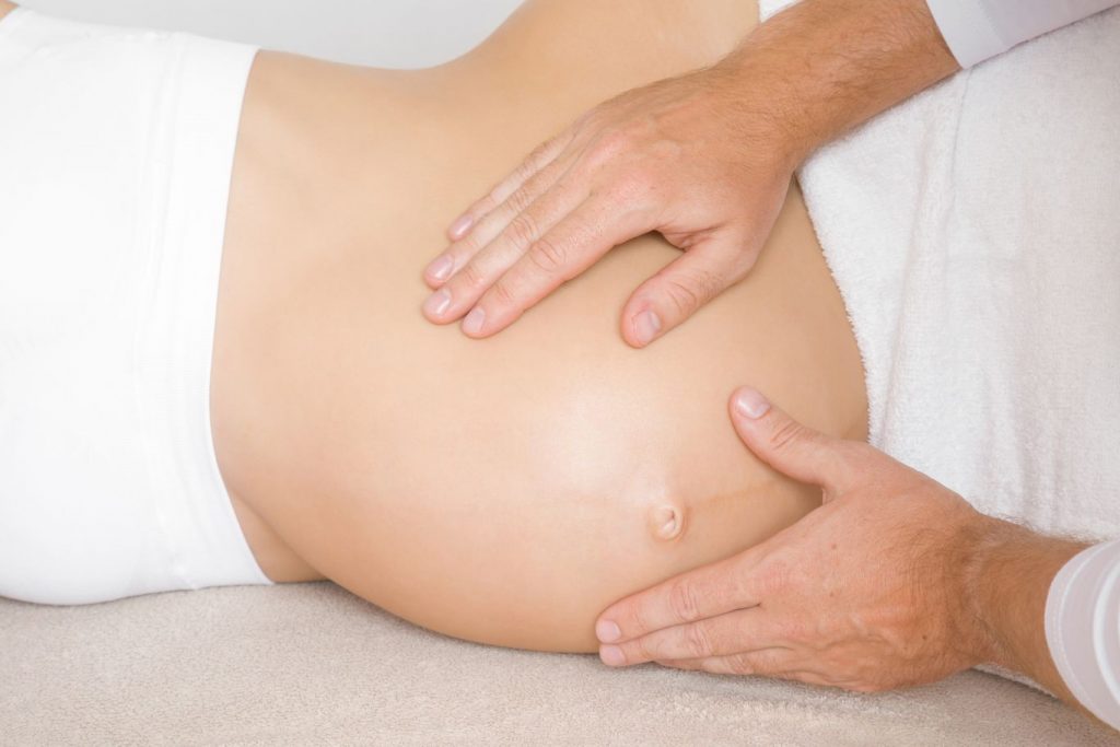 Pregnant woman receiving breech presentation care