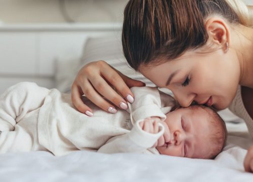 Mother and baby dealing with muscle & joint stiffness